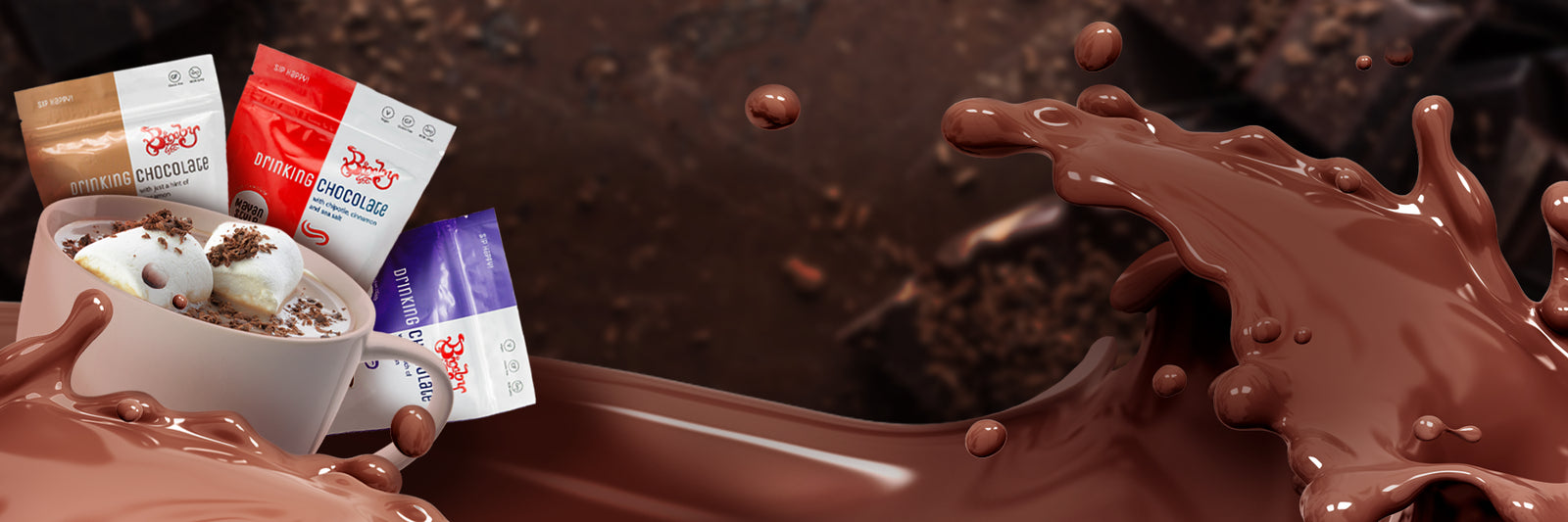 Packets of hot chocolate mix and a cup of hot chocolate with marshmallows and chocolate shavings are shown, surrounded by a rich splash of liquid chocolate against a blurred chocolate background.