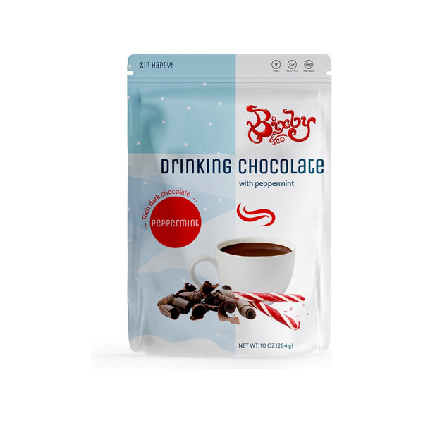 A resealable pouch of Bixby Chocolates Peppermint Drinking Chocolate features a cup of hot chocolate, chocolate curls, and peppermint sticks—perfect for cozy holiday mornings—all set against a white background.